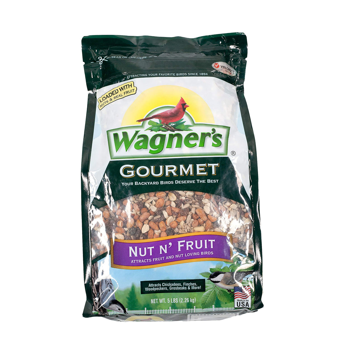 Wagner's Nut 'N Fruit Gourmet wild bird food at feeder view, supporting year-round feathered visitors.