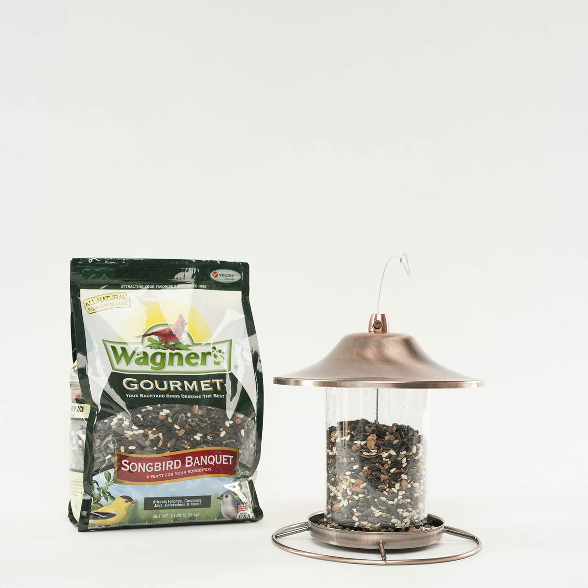Packaging of Wagner's Songbird Banquet 5lb bag shown for easy home feeding.