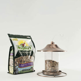 Wagner's mixed-bird scene shows multiple species attracted by the gourmet blend.