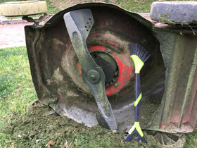 Walensee lawn mower deck cleaner brush removes grass efficiently under mower.