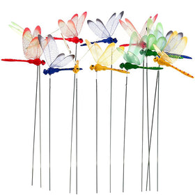 Warmshine dragonfly stakes arranged together brighten gardens with four vivid colors