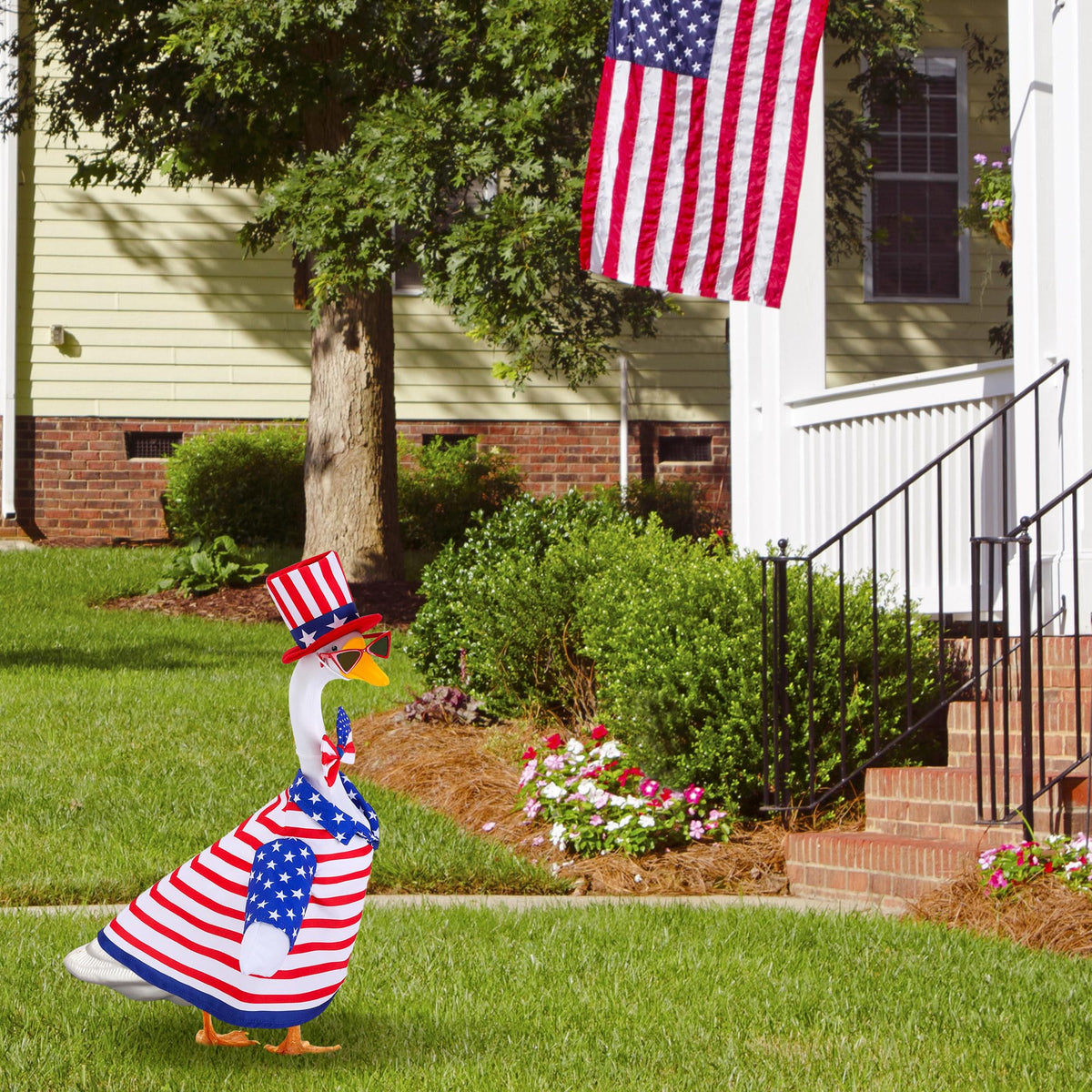 Watayo porch garden goose display highlights holiday charm outdoors.