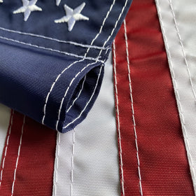 WDGG flag 12x18 fits standard hang sleeves for easy outdoor mounting.