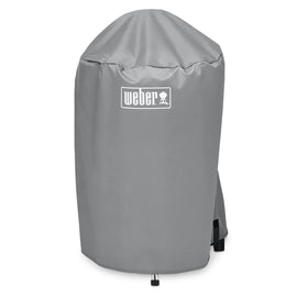 Weber 18-Inch Charcoal Kettle Grill Cover over grill protects from rain and sun