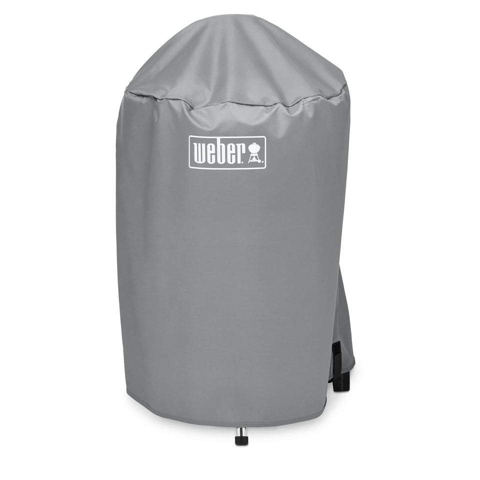 Weber 18-Inch Charcoal Kettle Grill Cover over grill protects from rain and sun