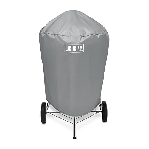 Weber 22-inch charcoal kettle cover, easy slip-on design for quick use.