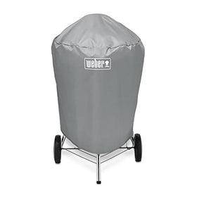 Weber 22-inch charcoal kettle cover, easy slip-on design for quick use.