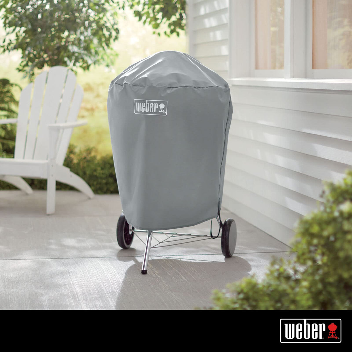 Weber 22-inch charcoal kettle cover, rear view, full coverage and fit.