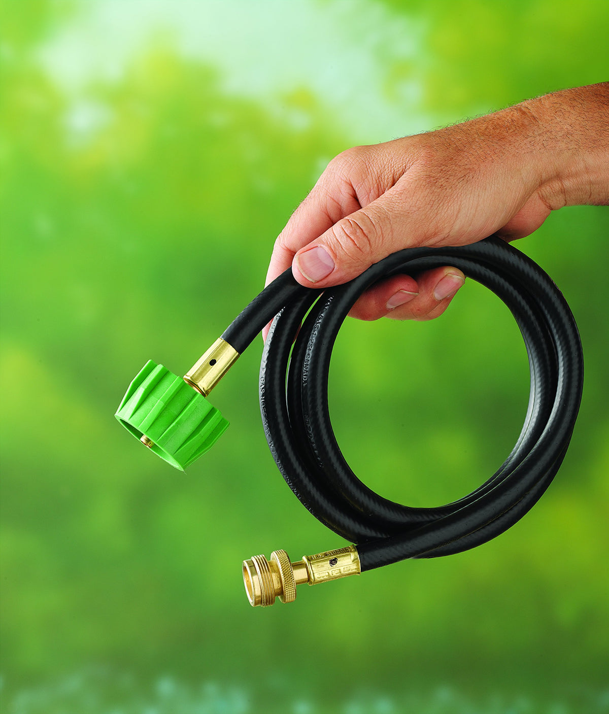 Weber adapter hose shows durable six foot flexibility for easy grill placement.