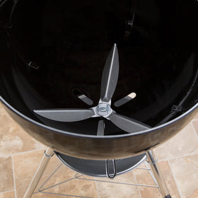 Weber ash sweeper component close-up highlighting durable aluminum construction.