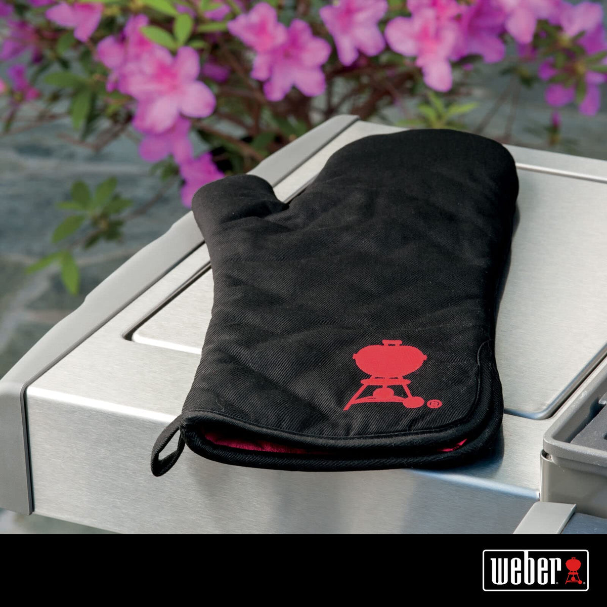 Weber Barbecue Mitt embroidery detail emphasizes the iconic red kettle motif.