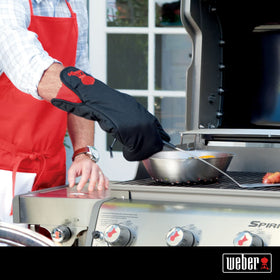 Weber Barbecue Mitt storage folded illustrates compact, ready-to-grill storage.