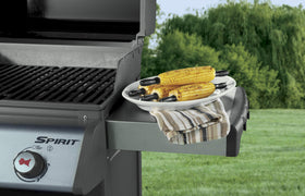 Weber corn pick set close-up shows comfortable grips and thumb grooves.
