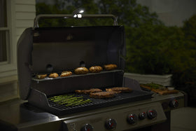 Weber detachable light shines where you need extra illumination.