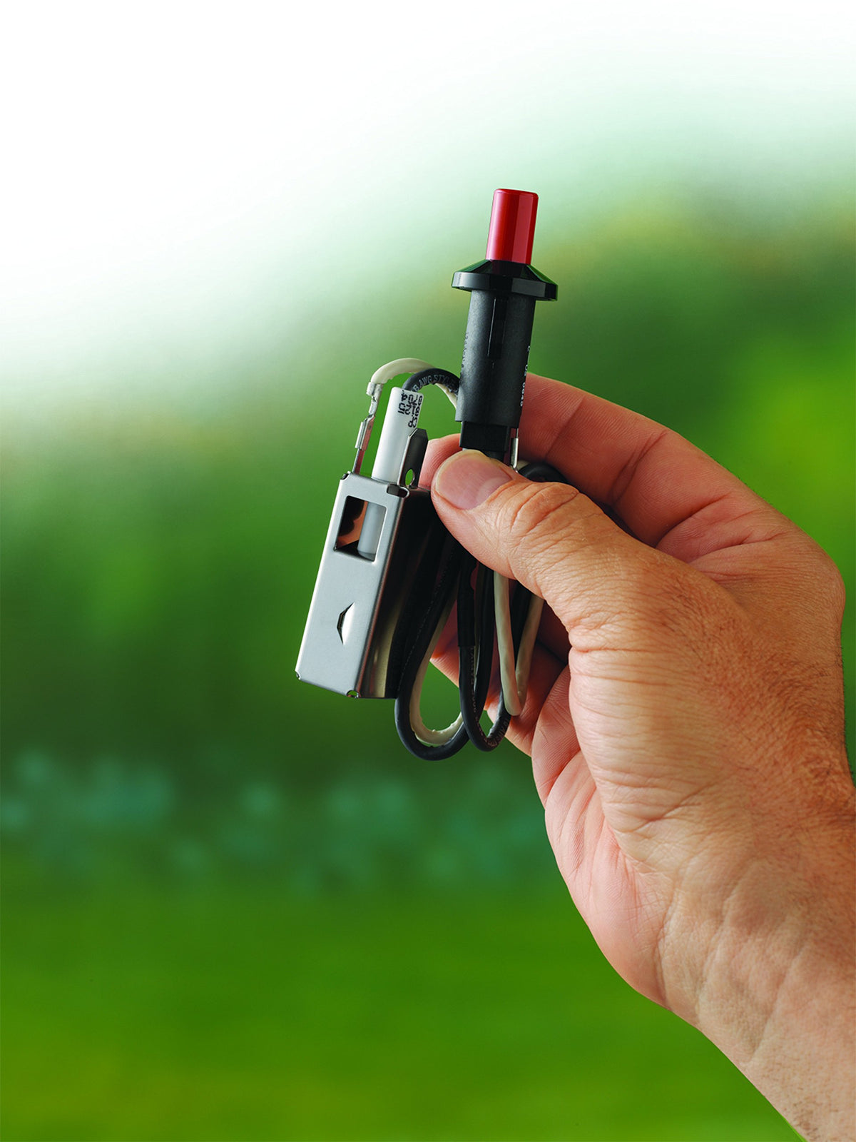 Weber gas-catcher ignition chamber component shown for reliable flame control