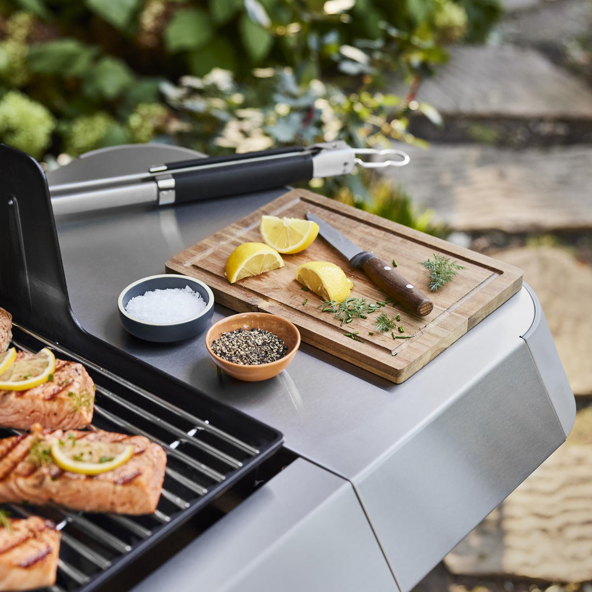 Weber Genesis S-315 stainless steel cooking grates heat evenly.