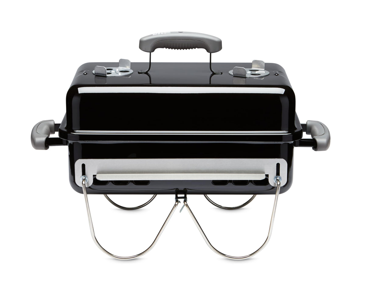 Weber Go-Anywhere compact charcoal grill for easy transport and quick setups.