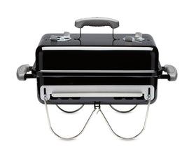 Weber Go-Anywhere compact charcoal grill for easy transport and quick setups.