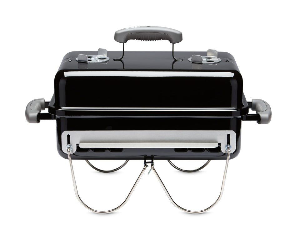 Weber Go-Anywhere compact charcoal grill for easy transport and quick setups.