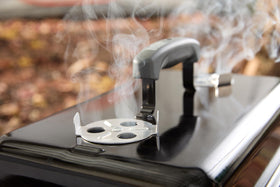 Weber Go-Anywhere grilling area fits 2–4 people for meals.