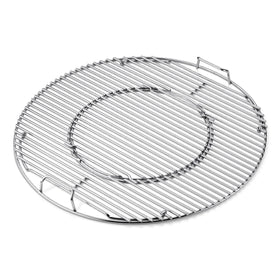 Weber Gourmet BBQ System hinged cooking grate in action for easy charcoal access.