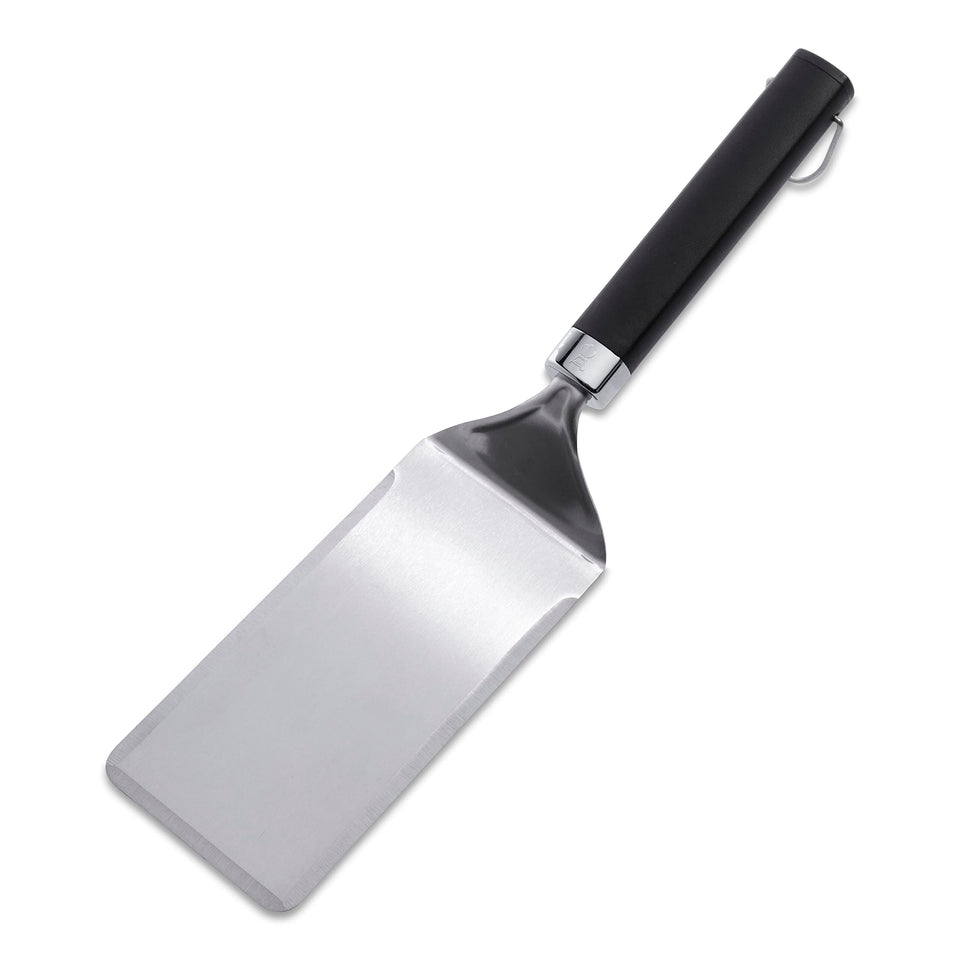 Weber Griddle Spatula with beveled edge slides under foods for smooth flips