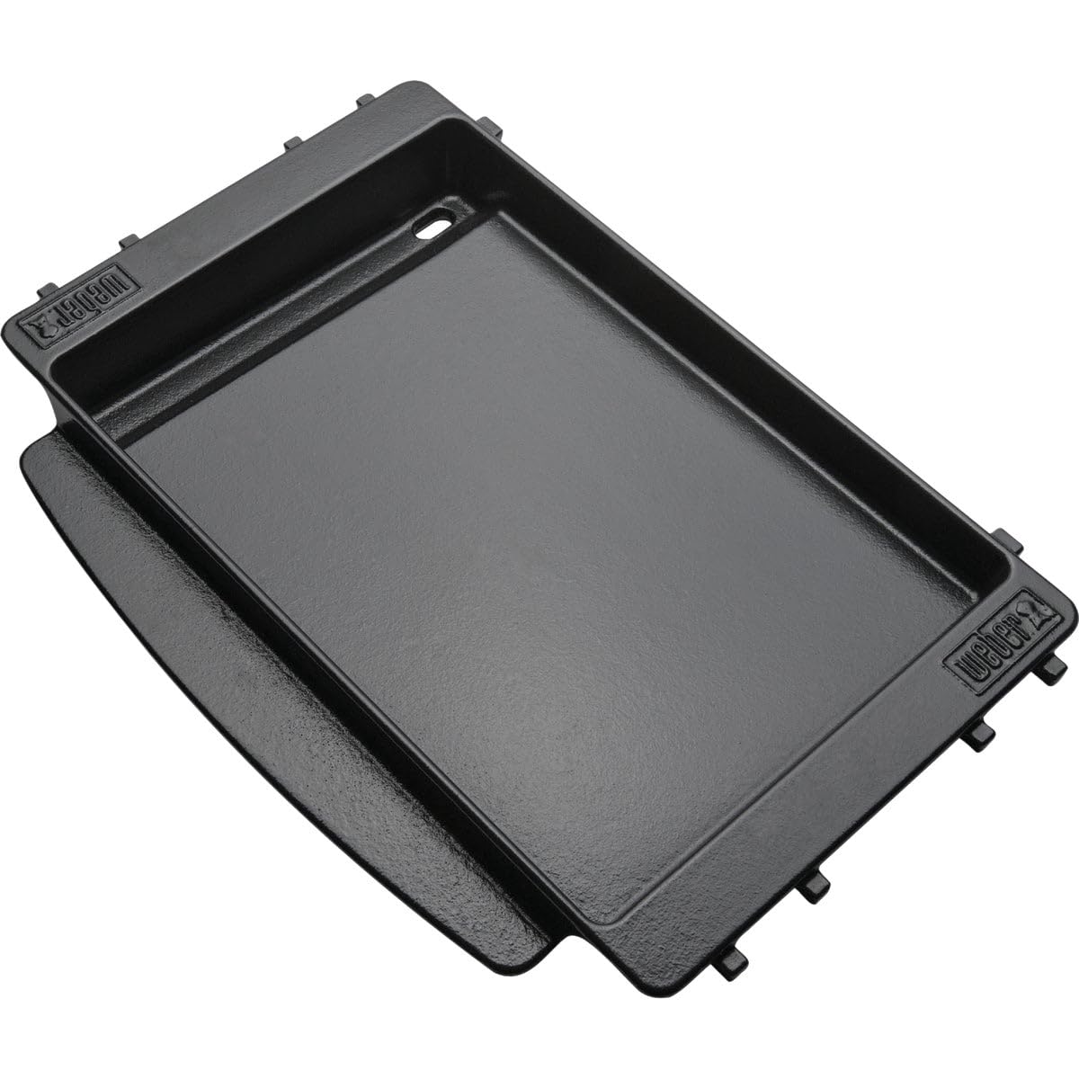 Weber griddle cleaning with ice cubes or water on a hot surface.