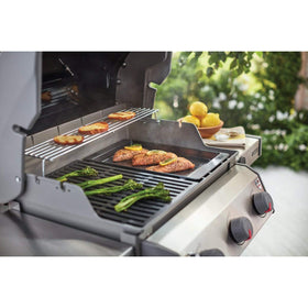 Weber griddle with non-stick surface for easy flipping and cleaning.