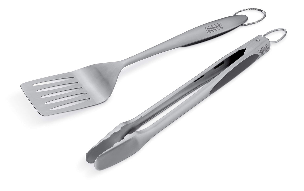 Weber hands-free locking tongs secured for safe cooking and storage.