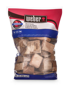 Weber Hickory Wood Chunks on grill showcase, infusing meats with subtle sweetness and depth