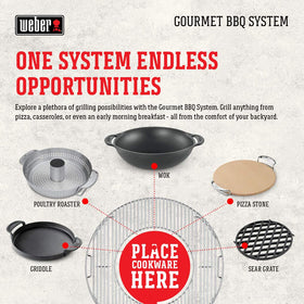 Weber kettle grill hinged grate demonstrates safe mid-cook fuel addition.