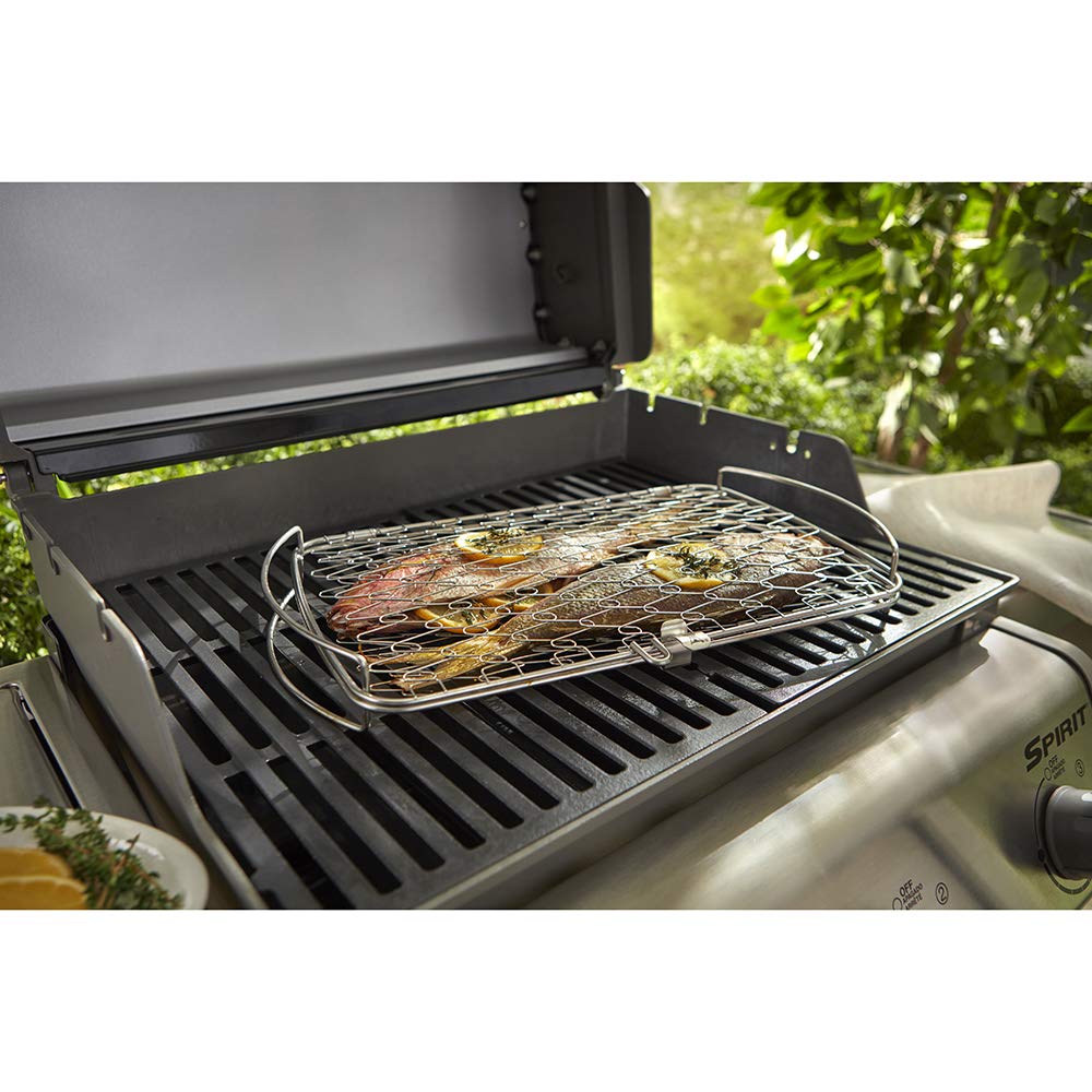 Weber large fish basket elevates food from grates for even cooking.