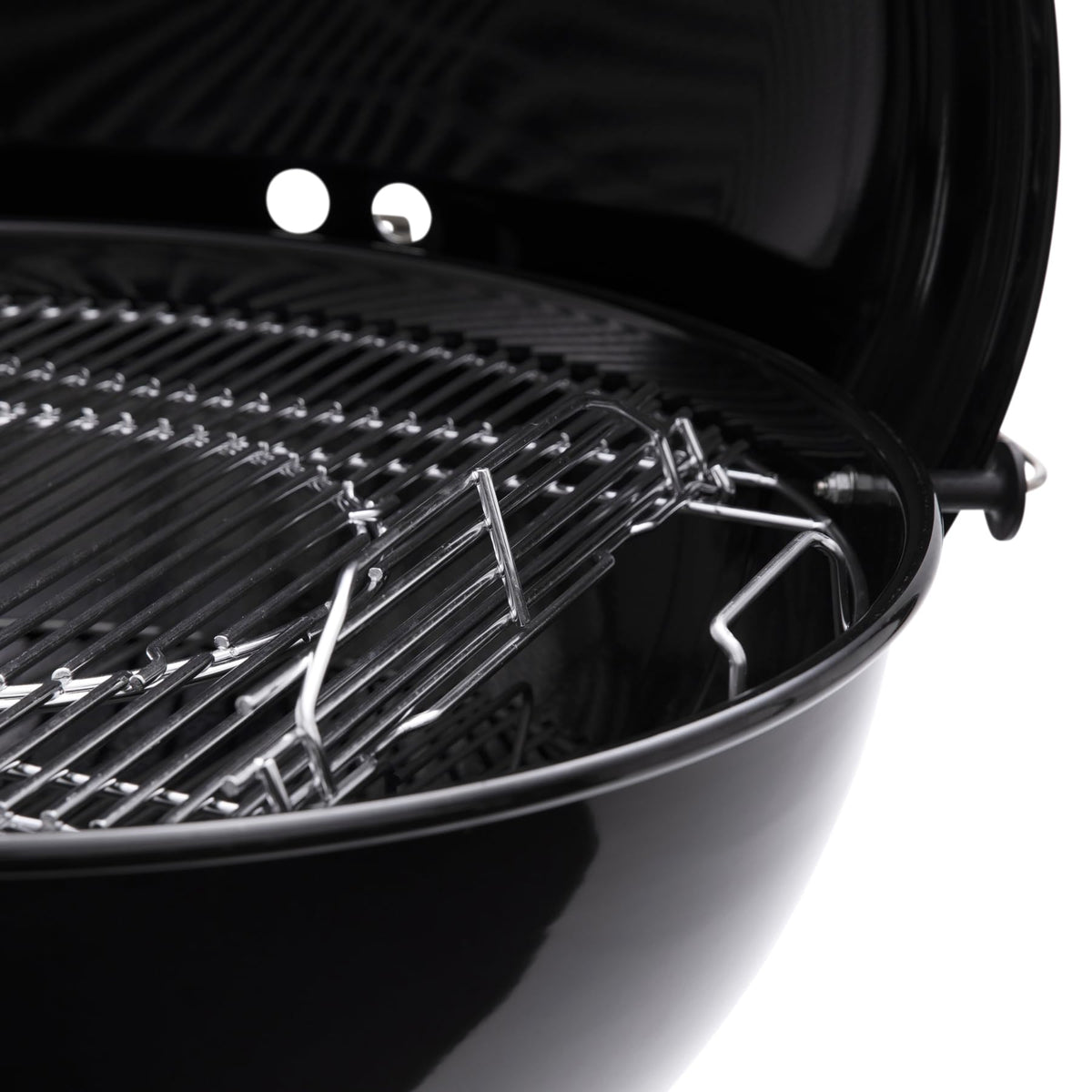 Weber Crafted cooking grate provides durable, even heat for consistent searing.
