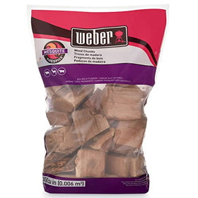 Weber Mesquite Wood Chunks closeup showing chunky texture for steady heat.