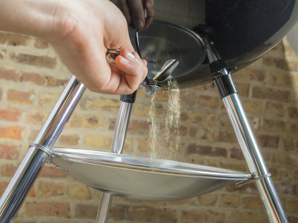 Weber Original Kettle 18-inch cooking grate offers durable surface.