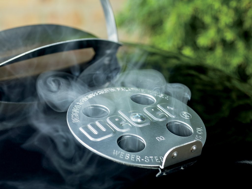 Weber Original Kettle 18-inch lid hook keeps lid off ground.