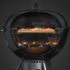 Weber pizza stone ready for cheese melt and toppings
