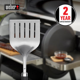 Weber Precision Grill Wide Spatula soft-touch handle shown for non-slip grip during grilling