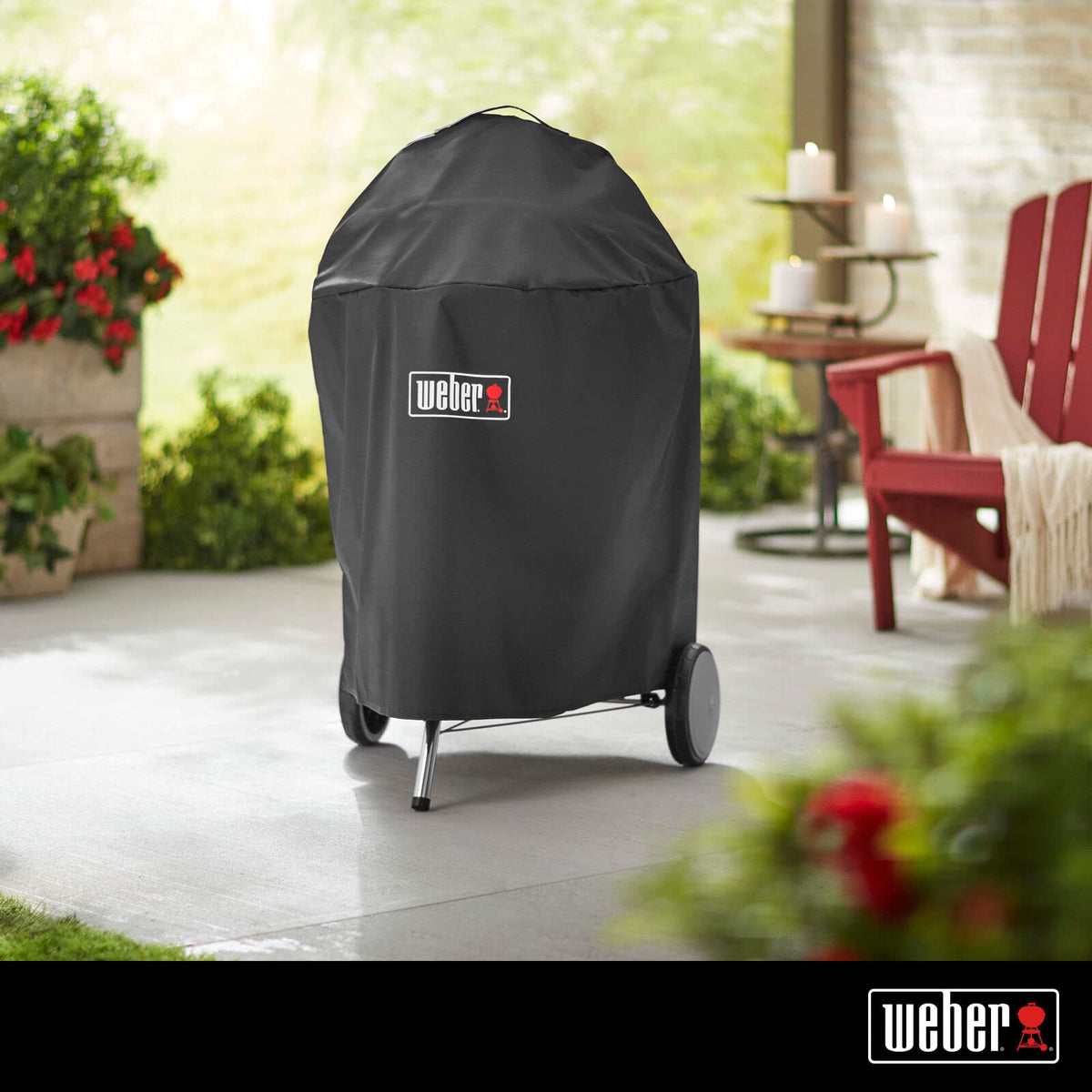 Close-up of Weber Premium 22-inch cover resisting rain with water-resistant fabric