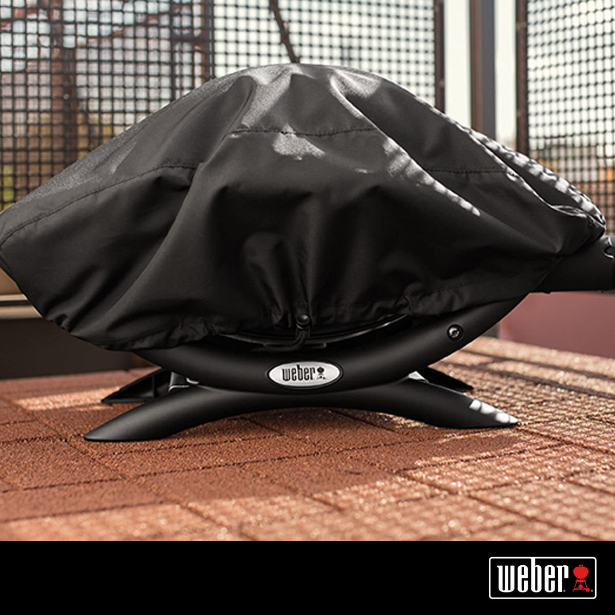 Weber bonnet cover enables quick on/off for easy outdoor storage.