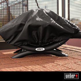Weber bonnet cover enables quick on/off for easy outdoor storage.