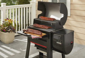Weber Searwood 600 front table folded away for compact storage