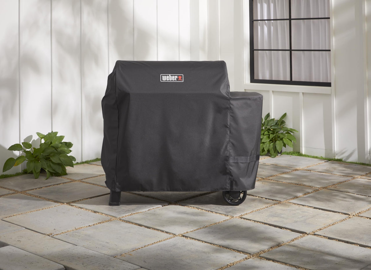 Weber Searwood 600 XL Pellet Grill Cover uses weatherproof material for outdoor durability.