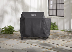 Weber Searwood 600 XL Pellet Grill Cover uses weatherproof material for outdoor durability.
