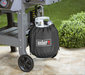 Weber tank cover showing drawstring secure fit on a standard propane tank