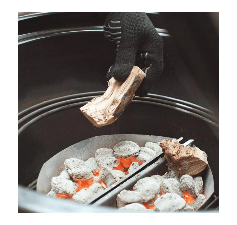 Weber kettle-mounted hooks keep essential tools ready.
