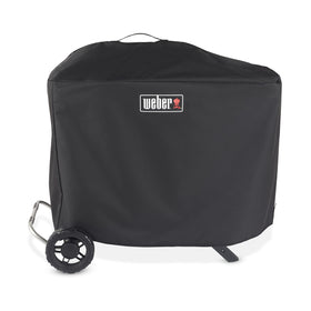 Weber Traveler Premium Cover on upright grill for weather protection