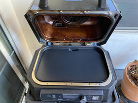 Webroil OG951 griddle pan searing steak with even heat