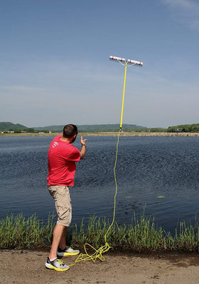 Weed Razer Jenlis Razer Rake extended 9-foot handle reaches into shallow water for debris collection.