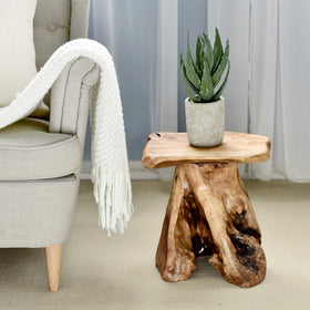 WELLAND cedar-stump table showcases durable, timeless appeal for indoor or outdoor spaces.